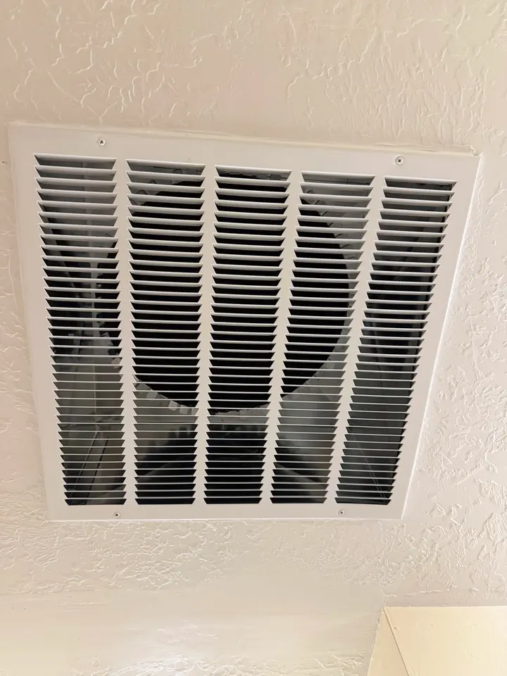 Large return air grille mounted on a wall