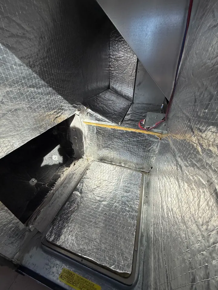 Inside a foil lined plenum during service