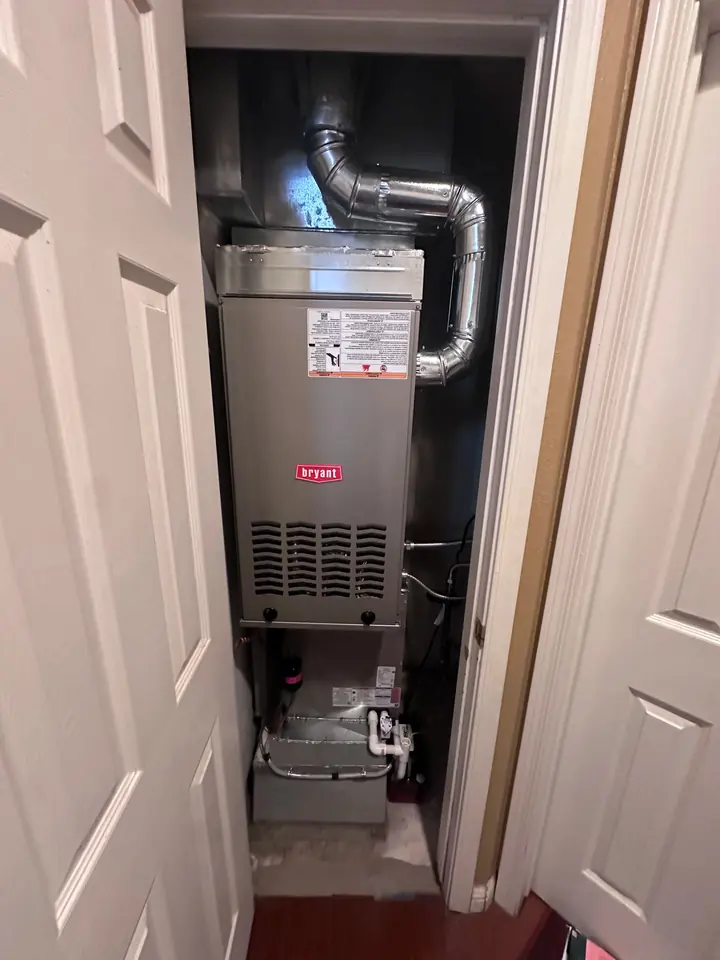 New furnace installed in a closet with fresh venting