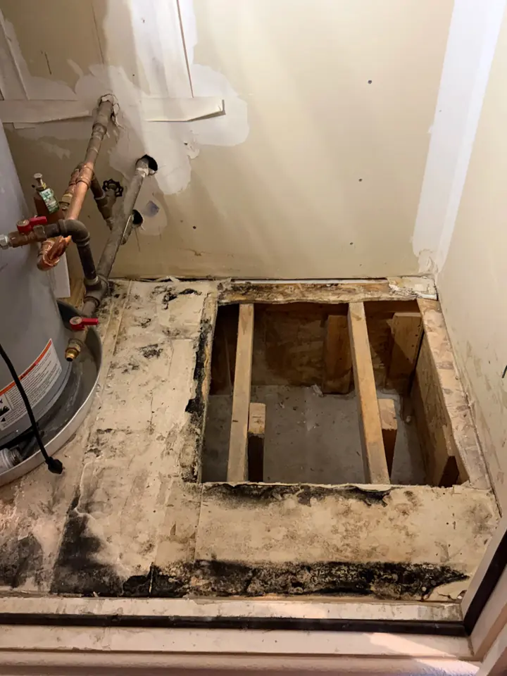 Water heater platform opened up to repair the floor