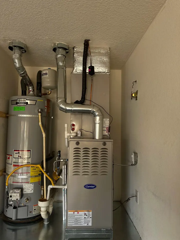 Furnace and water heater in a utility room