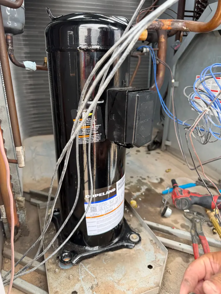 New compressor wired into an outdoor unit