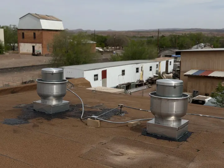 Rooftop exhaust fans on a commercial building